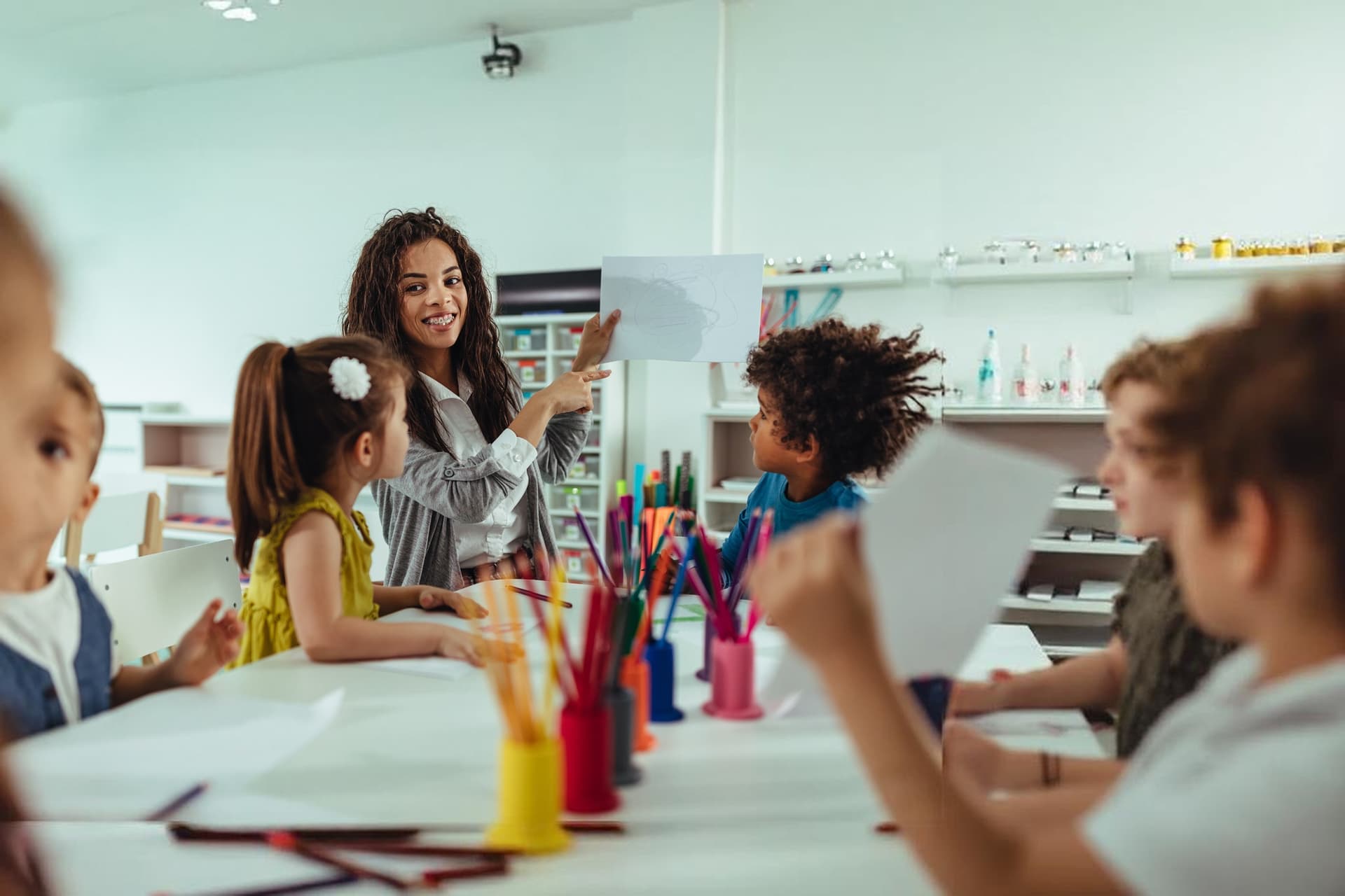 A Creation Kingdom teacher with children in the classroom